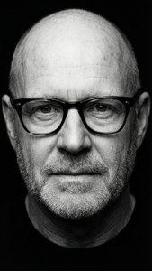 High-contrast black and white close-up of Ken Bruce.