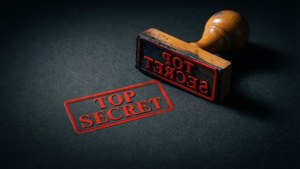 TOP SECRET stamp with shadow on dark background, minimalist.