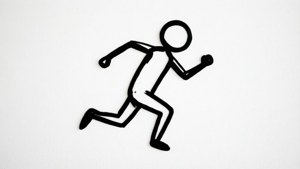 A simple black stick figure running on white background.