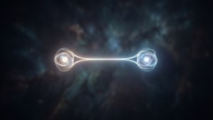 Dua partikel bercahaya yang dihubungkan oleh benang terang di latar belakang nebula gelap.