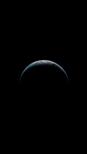 Crescent Earth viewed from space with glowing continents and city lights against black void. — Exceptional Picture