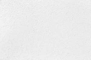 White stucco wall texture for design or background use.