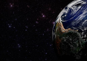 Planeten Jorden set fra rummet med stjerner i baggrunden.