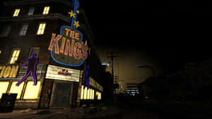 Placa de guitarra néon num edifício de tijolo à noite com estrelas acima. — Fallout Nv Papéis de Parede