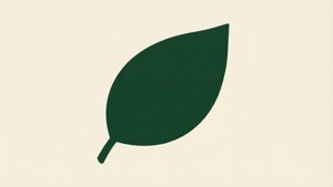 Minimalistinen lehtitaustakuva, jossa tasainen vihreä väri kerman sävyllä.