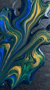 Abstract fluid art with swirling blue green and gold paint on dark slate. — Fluid Wallpaper