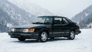 Black Saab Sonett III on a snowy mountain road in winter. — Saab Sonett Picture