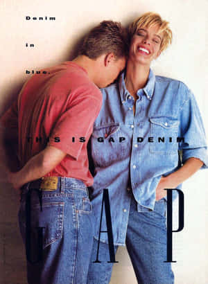 A happy couple wearing denim clothing in a Gap ad. — Gap Background
