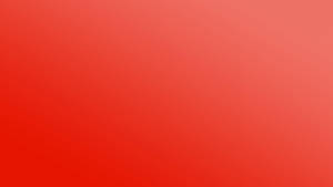 Fundo gradiente vermelho vibrante com transição suave de cor do carmesim profundo ao coral suave.