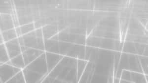 Linee della griglia bianche luminose che si ritirano in un vuoto digitale grigio morbido. — Modern Desktop Sfondi