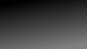 Un fondo de gradiente suave de negro a gris para uso digital
