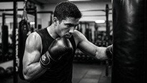 Alex Caceres training hard in the gym. — Alex Caceres Wallpaper