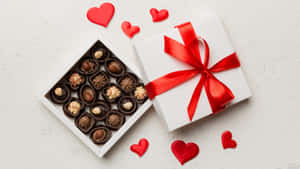 Scatola di Cioccolatini con Nastro Rosso