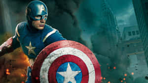 Captain America holding his shield amidst urban destruction and flames. — Hero Wallpaper