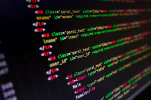 Närbild av färgglad HTML- och CSS-kod på en mörk datorskärm.