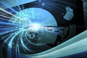 Close-up of a hard drive with glowing blue data streams and digital particles.