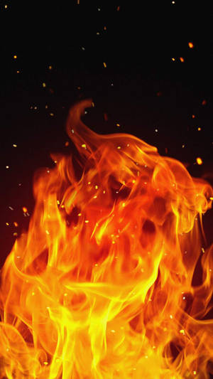 Dynamic flames with glowing embers rising against a dark background. — Dark Neon iPhone Picture