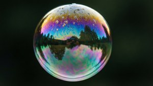 Ethereal 16K macro of a soap bubble with iridescent rainbow film.