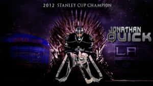 Hockey goalie Jonathan Quick seated on a throne at night with Staples Center behind him. — Quick Picture