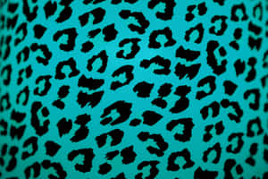 Teal tyg med svart leopardmönster närbild