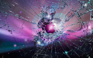 Apple logo glowing through shattered glass against a starry cosmic background. — Aesthetic Mac Wallpaper