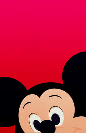 Mickey Mouse smiling with big eyes against a red background. — Mickey Picture