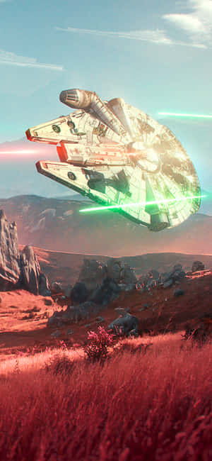 Millennium Falcon firing green lasers over a red alien desert at dusk. — Millenium Falcon Picture