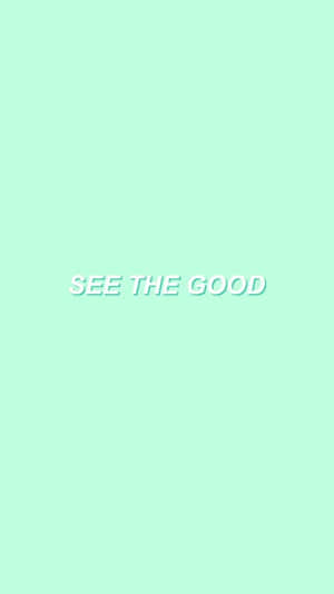 Mintgrøn baggrund med hvid motiverende tekst, der siger SEE THE GOOD. — Mint Wallpapers
