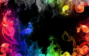 Colorful smoke swirls form floral shapes against a black background. — Lavish Picture