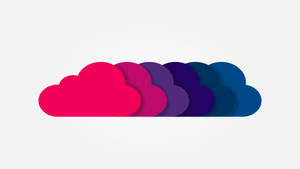 A colorful abstract cloud graphic with gradient layers from pink to blue. — Clouds Background
