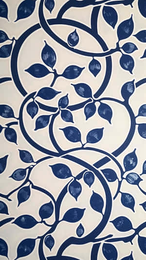 Blue leafy vine pattern on cream background with brushstroke texture.