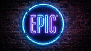 Logo Epic Games yang diterangi neon di dinding bata pada malam hari.