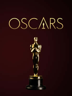 Golden Oscar statuette with 'OSCARS' text on maroon background — Oscars Picture
