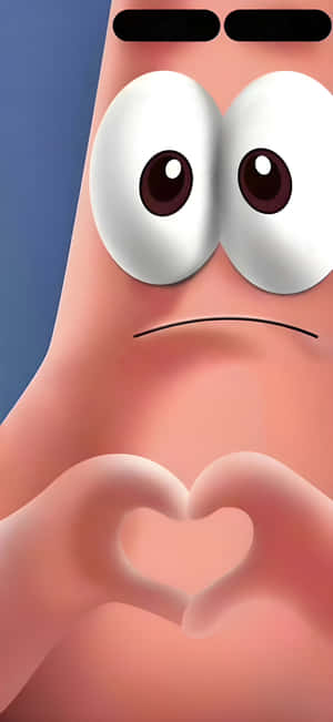 Patrick Star formt mit seinen Händen ein Herz, während er traurig aussieht. — Lustiger Patrick Wallpaper