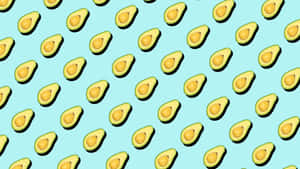 Repeating avocado slices on a blue background. — Diagonal Picture