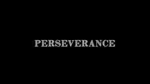 Kata perseverance dalam font putih dekoratif pada latar belakang hitam.