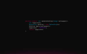 Code snippet updating desktop wallpaper with colorful syntax on a dark background.
