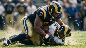 Intense defensive play with a sack by the Rams