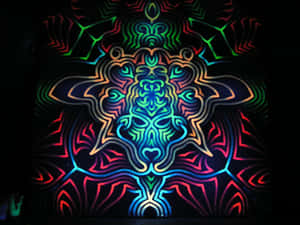 A glowing neon mandala with intricate symmetrical patterns in vibrant colors.