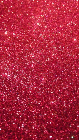 Vibrant red glitter texture with sparkling particles. — Red Glitter Wallpaper