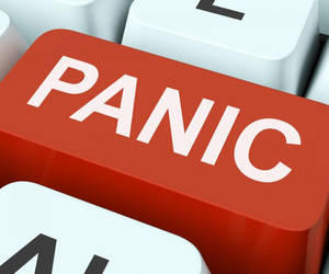 A red keyboard key labeled panic surrounded by white keys.