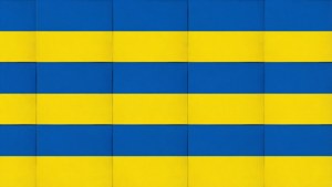 Sømløst gentagende mønster af ukrainske flagstriber som baggrund.