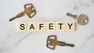 Vier Metallschlüssel um Fliesen angeordnet, die safety auf Marmor buchstabieren — Fünf Nächte Bei Freddys Security Breach Wallpaper