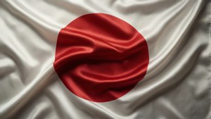 Det japanske flag gengivet som flydende hvid silke med en rød cirkel, elegant og blødt.