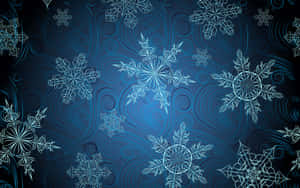 Blue snowflake pattern with swirling lines on dark background — Snowflake Wallpaper