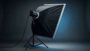 A high-quality studio light with softbox on a stand, perfect for product photography.