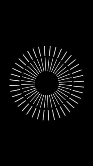 A white geometric radial pattern on a black background. — Solid Black Picture