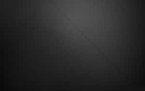 Dark leather surface with diagonal stitching and subtle lighting gradient. — Solid Black Picture