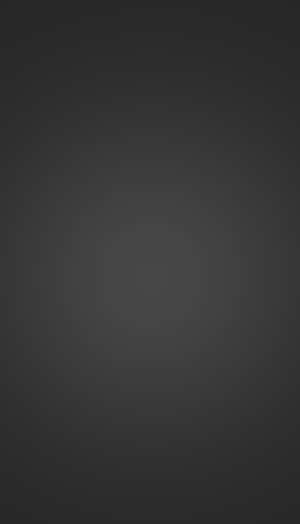 Dark gray gradient with subtle concentric circles for minimalist digital background. — Solid Black Picture