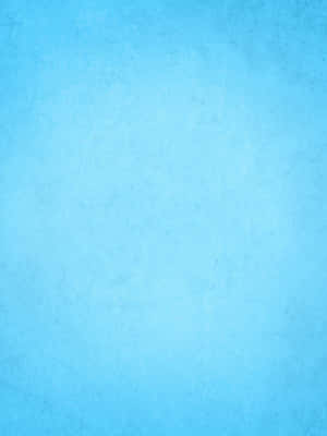 Soft textured light blue background with subtle gradient and grainy surface details. — Solid Blue Picture